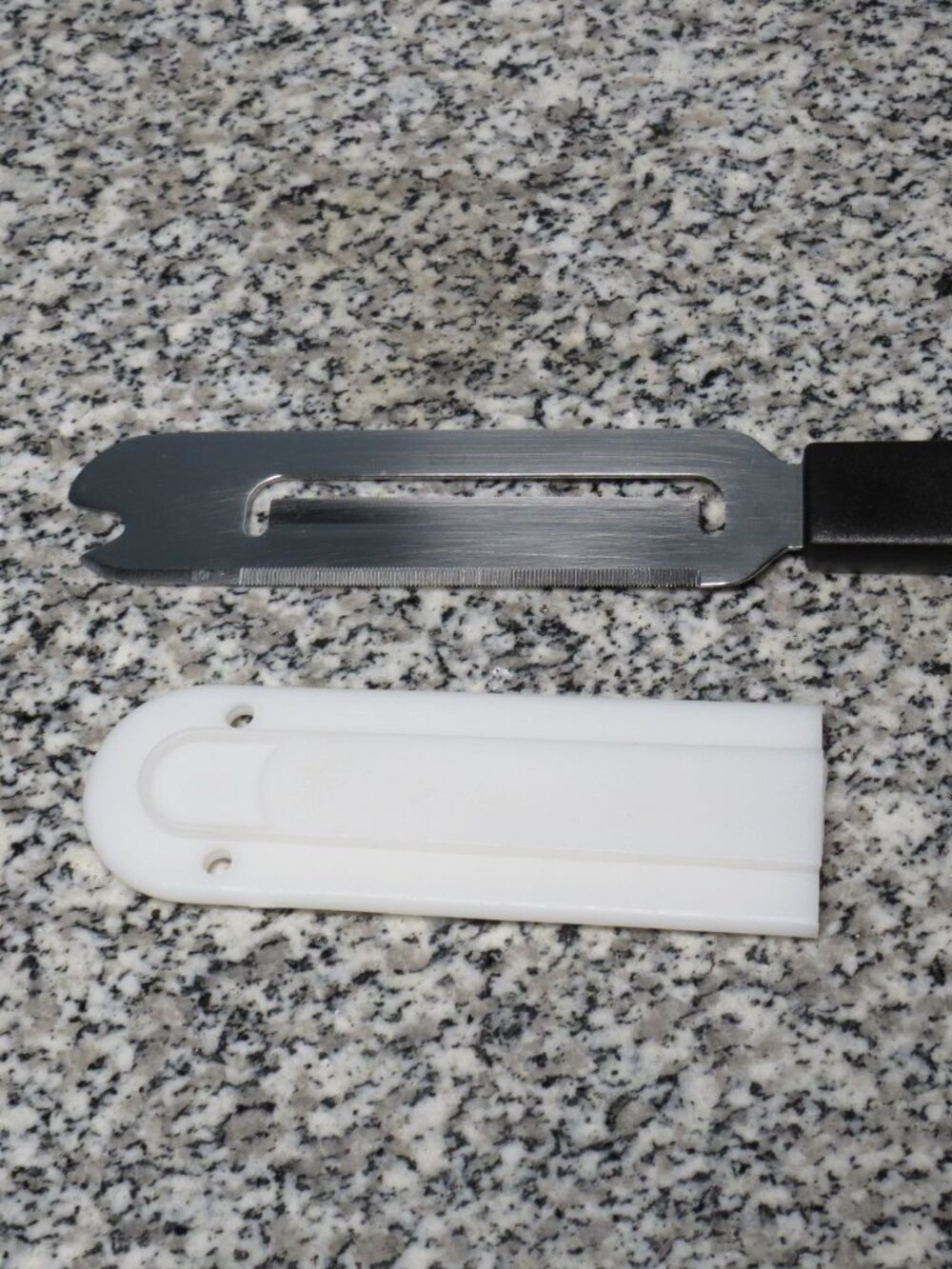 The Pampered Chef Cheese Knife + Blade Guard